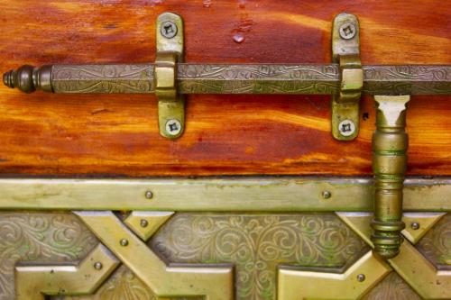 a close up of a wooden box with a handle at Riad Noumidya in Fès