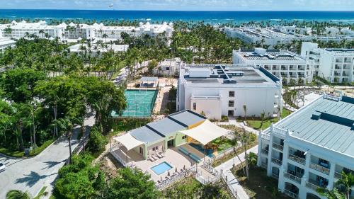 an aerial view of a city with buildings and the ocean at Riu Palace Bavaro - All Inclusive in Punta Cana