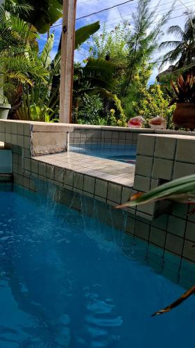 Πισίνα στο ή κοντά στο Amanda's Place Green Studio - pool and tropical garden