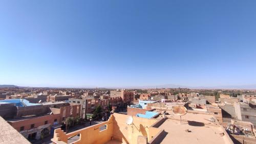 an aerial view of a city with buildings at Afgo Hostel in Ouarzazate