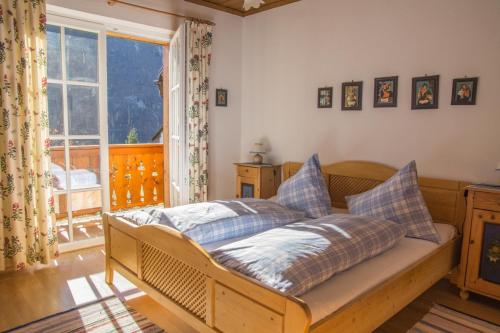 Postel nebo postele na pokoji v ubytování Haus Paradies am See