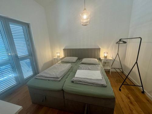 Postel nebo postele na pokoji v ubytování NINOA holidays