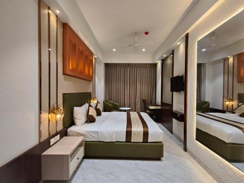 Katil atau katil-katil dalam bilik di Hotel Sonesta Suites - Thane