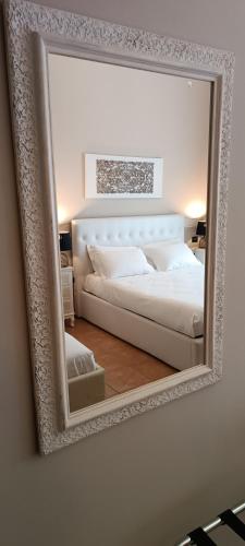 Ein Bett oder Betten in einem Zimmer der Unterkunft Hotel Palladium