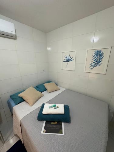 Postel nebo postele na pokoji v ubytování Cantinho Aconchegante - Quarto 04 Ar-condicionado