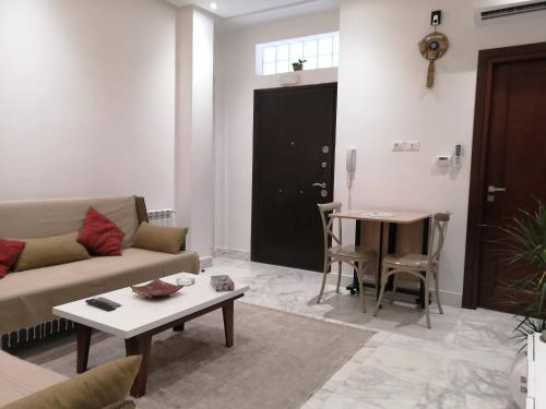 Posezení v ubytování Jolie Chambre coquet
