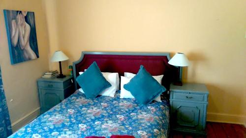 Ένα ή περισσότερα κρεβάτια σε δωμάτιο στο Dunromin