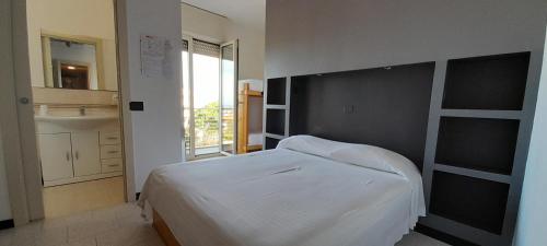 Postel nebo postele na pokoji v ubytování Hotel Marbella