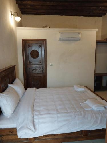 Ένα ή περισσότερα κρεβάτια σε δωμάτιο στο ORPHEUS OTEL-Konak