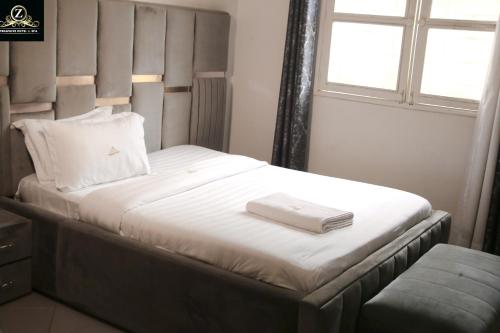 Cama o camas de una habitación en Streamlive Hotel and Spa