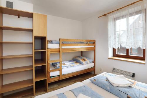 Postel nebo postele na pokoji v ubytování Penzion Skála