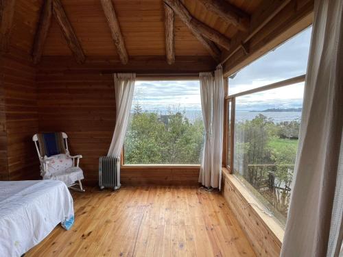Ένα ή περισσότερα κρεβάτια σε δωμάτιο στο Casa Borde lago y playa volcanes