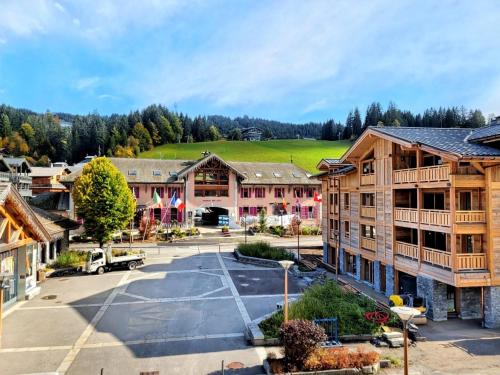 Charmant appartement 4 pièces au cœur des Gets avec balcon et parking