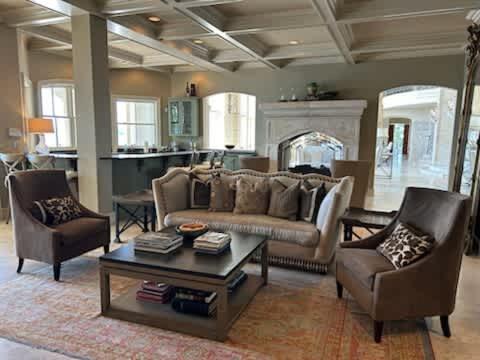 a living room with a couch and two chairs and a table at Lakeside Grande Villa in Alexander City
