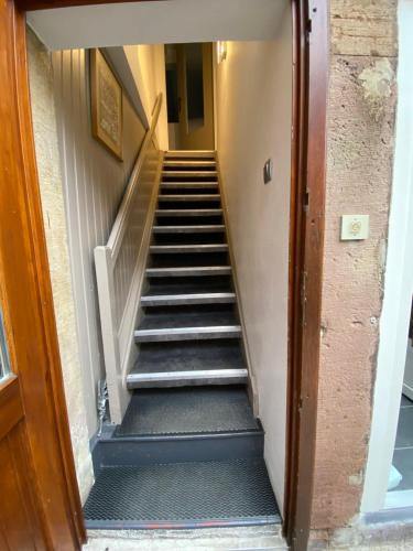 a stairway leading up to a building at Appartments Rue Des Châteaux in Ottrott