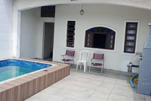 Novidade na Booking.comPraia privativa Casa com piscina praia grande Menor preço em Novidade na Booking.comPraia privativa Casa com piscina praia grande
