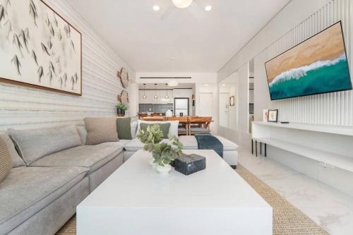 a living room with a couch and a table at New Condo With 2BR in San Lucas in Cabo San Lucas
