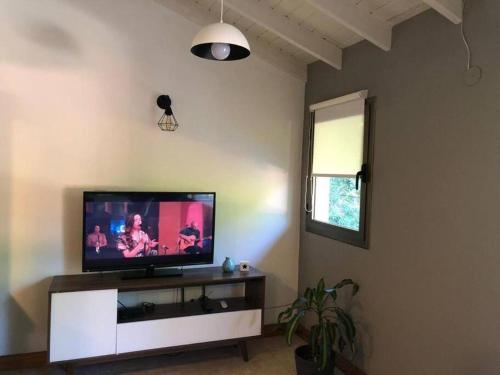 TV a/nebo společenská místnost v ubytování Departamento para 4 personas