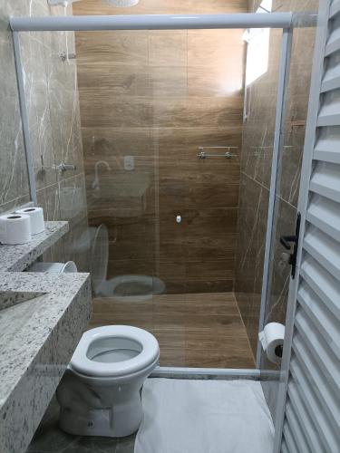 Bilik mandi di Pousada VKG Suites