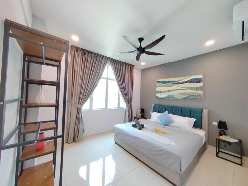 Katil atau katil-katil dalam bilik di Ipoh Meru 3 Bedroom Suites by IWH Suites