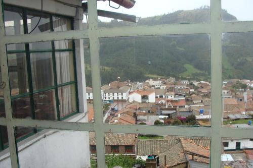 a view of a city from a window at Hotel Portón De Ocetá in Monguí