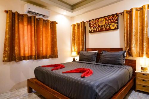 Katil atau katil-katil dalam bilik di Pinthong Aonang Villa