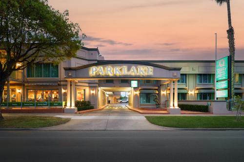 a building with a parking garage in front of it at Quality Hotel Parklake Shepparton in Shepparton