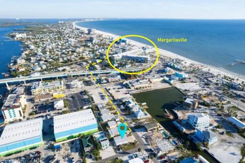 an aerial view of a beach with a yellow circle at DOWNTOWN 3rd Street Retreat Lookout in Fort Myers Beach