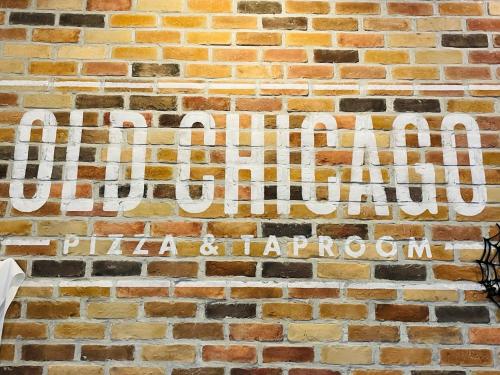a sign on the side of a brick wall at Best Western Plus Dubuque Hotel and Conference Center in Dubuque