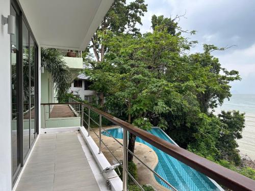 a balcony with a view of the ocean at 4bedroom Villa Siray Beach Front in Phuket Town