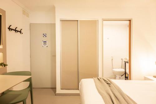 Postel nebo postele na pokoji v ubytování Recoleta Suites