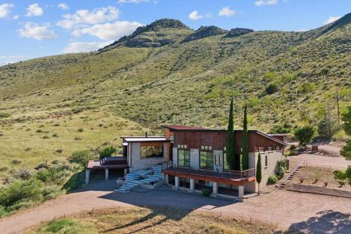a house in the middle of a mountain at Ranch in Elgin