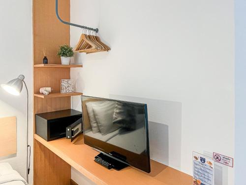 TV a/nebo společenská místnost v ubytování Anda Ramkhamhaeng By St James Hotel