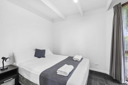 Postel nebo postele na pokoji v ubytování Sundown Villas