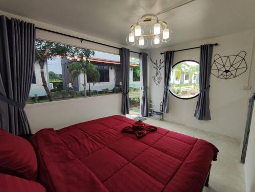 Postel nebo postele na pokoji v ubytování Phuphan Resort