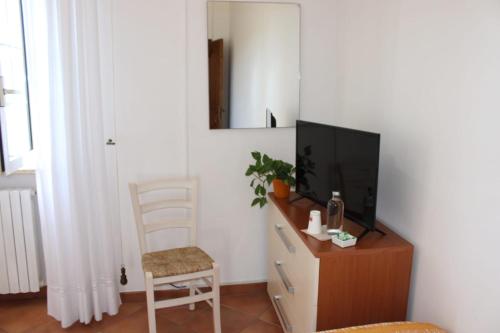 TV a/nebo společenská místnost v ubytování Contrada Macchia B&B