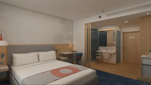 Una cama o camas en una habitación de Holiday Inn Express Bengaluru Whitefield ITPL by IHG