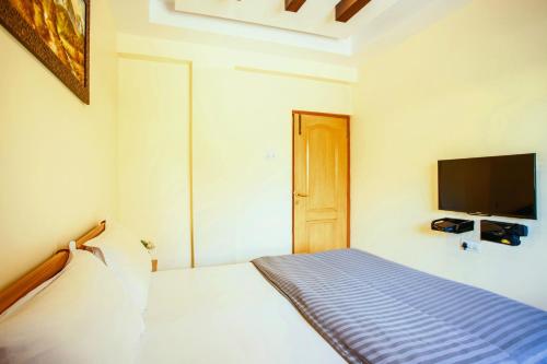 TV/Unterhaltungsangebot in der Unterkunft 'Golden Oceans' 3 bhk beach view villa