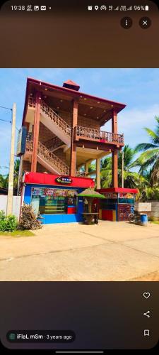 a large building with a building with at Lotus villa kattankudy in Kattankudi