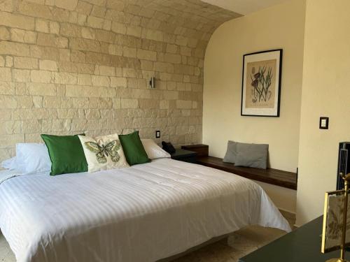 Postel nebo postele na pokoji v ubytování Porta Paradiso ValQuirico, Albergo Boutique