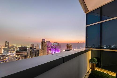a view of a city skyline from a building at Dubai Marina 3BR Penthouse with Stunning JBR, Marina & Dubai Eye Views in Dubai