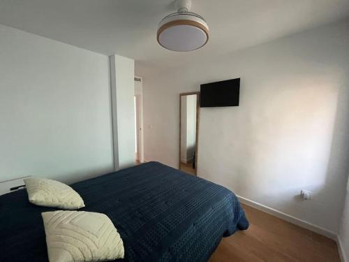 Postel nebo postele na pokoji v ubytování Apartamento Los Narejos