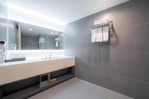 Koupelna v ubytování Davin Hotel