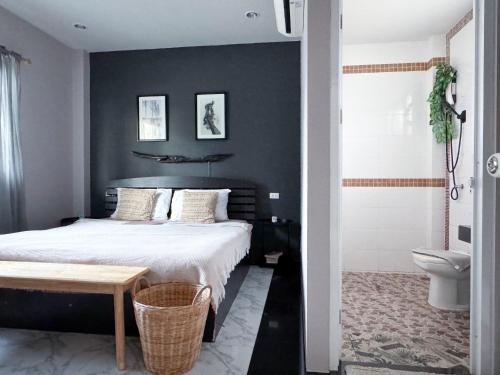 Ένα ή περισσότερα κρεβάτια σε δωμάτιο στο Sea Dreamer Beachfront Apartments