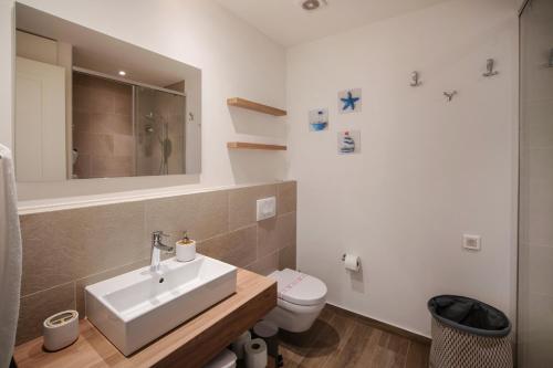 Koupelna v ubytování Lustica Bay Apartment - Centrale 4503