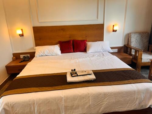 Postel nebo postele na pokoji v ubytování The Ashoka Hotels & Resorts, Panna