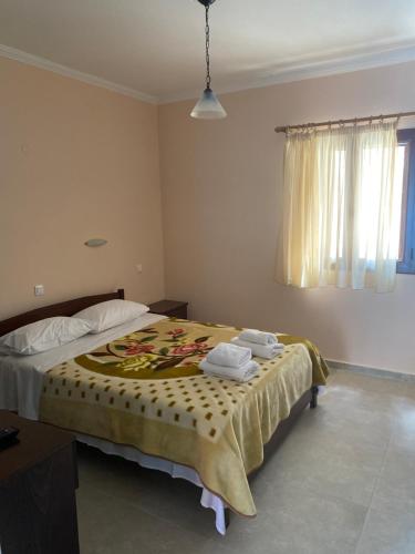 Ένα ή περισσότερα κρεβάτια σε δωμάτιο στο Studios&apartments Thomas
