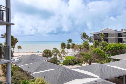a view of the beach from the balcony of a resort at Key West's Best in Key West