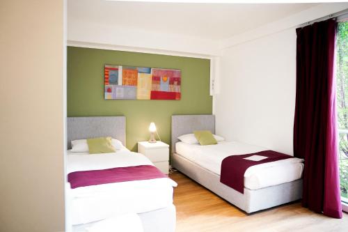 Katil atau katil-katil dalam bilik di urraum Hotel