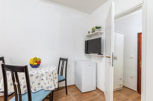 Μια τηλεόραση ή/και κέντρο ψυχαγωγίας στο Apartment Lucano 2365